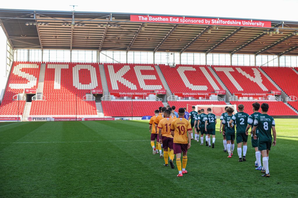 Players walking out at Stoke City FC 
